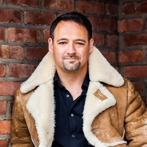 Photo of Derek B. Miller